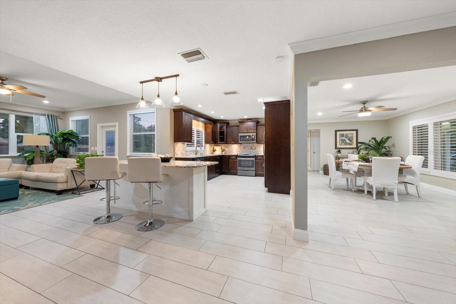 Open floorplan provides a spacious airy quality the moment one enters.