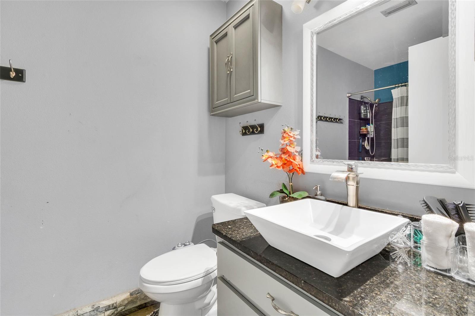 Primary Bath With Stone Countertops