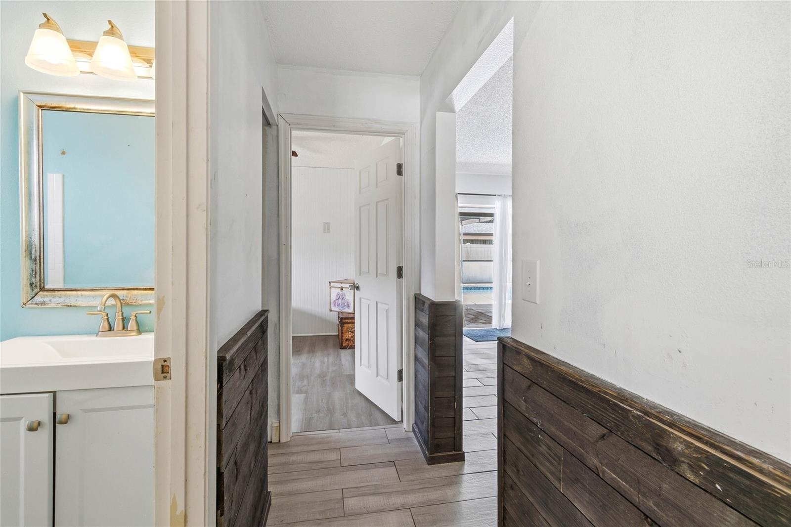 Hallway Showing Guest Bath Shared With Bedroom # 1 and 2