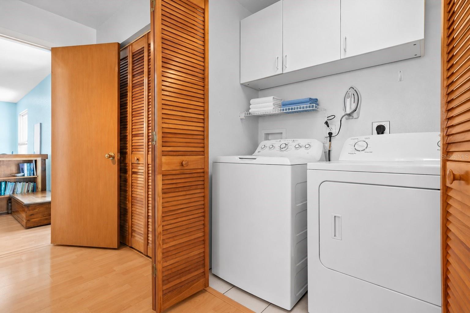 Laundry Closet with Cupboards