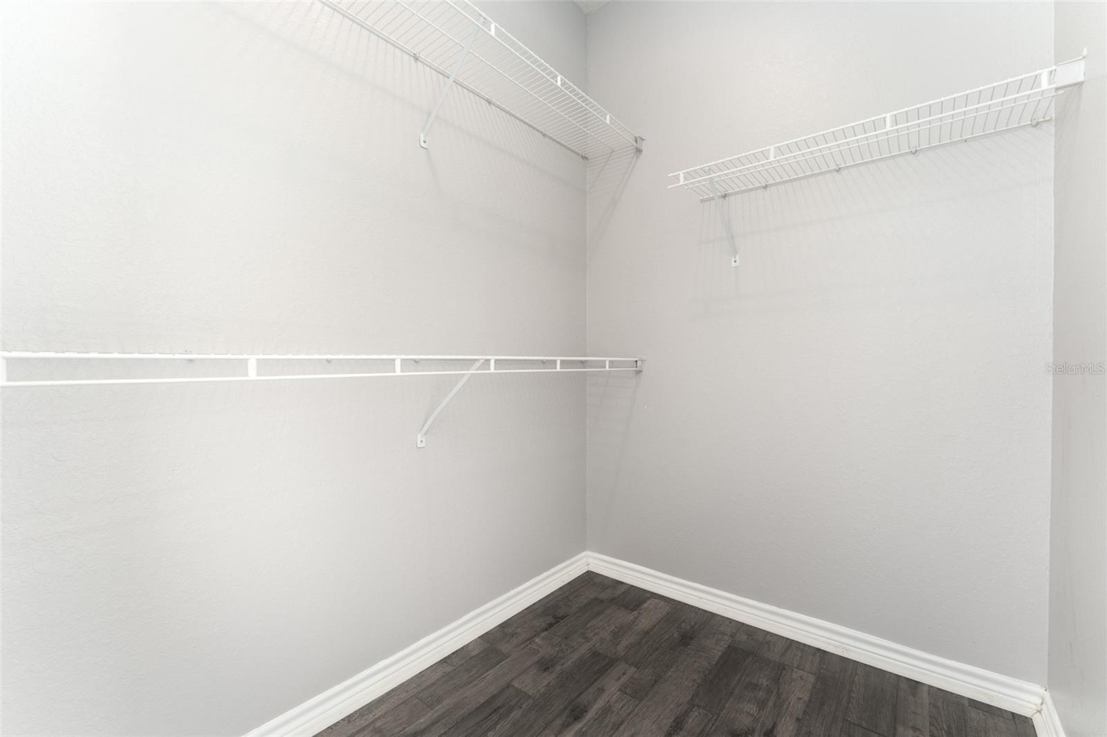primary bedroom walk-in closet