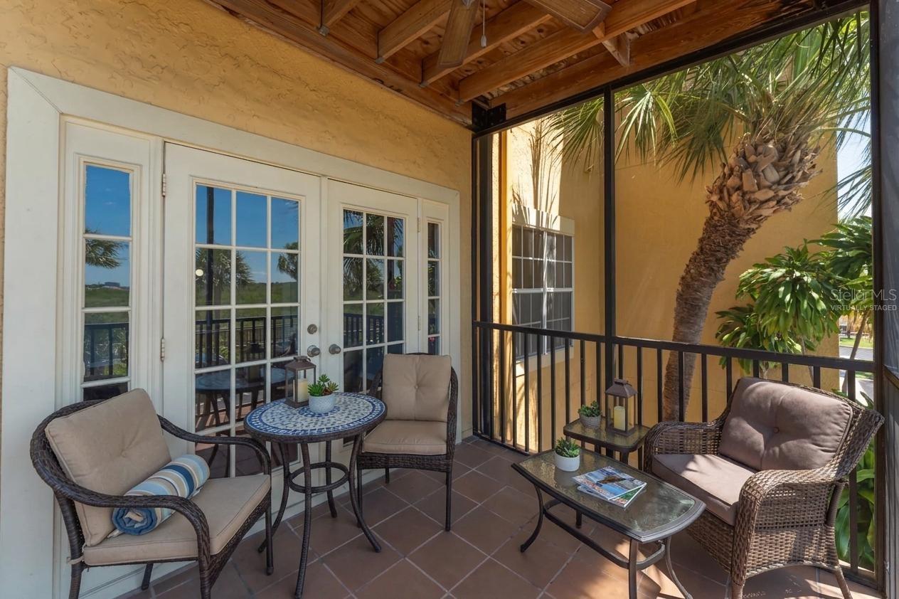 covered & screened balcony virtually staged