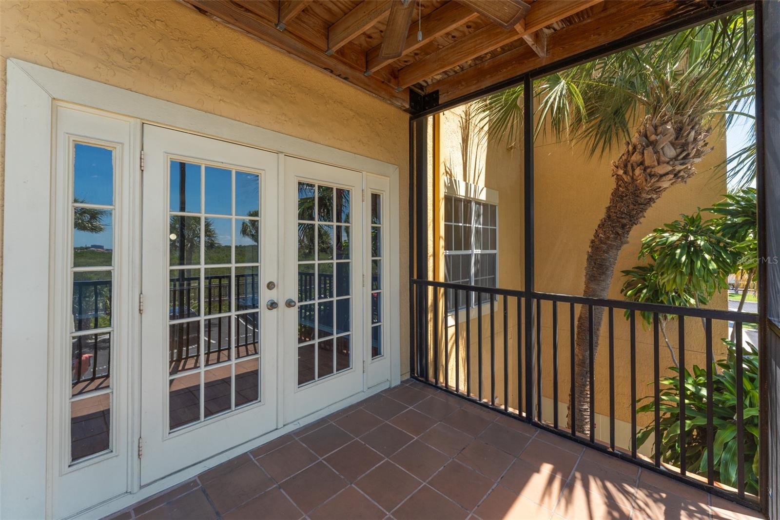 covered & screened balcony