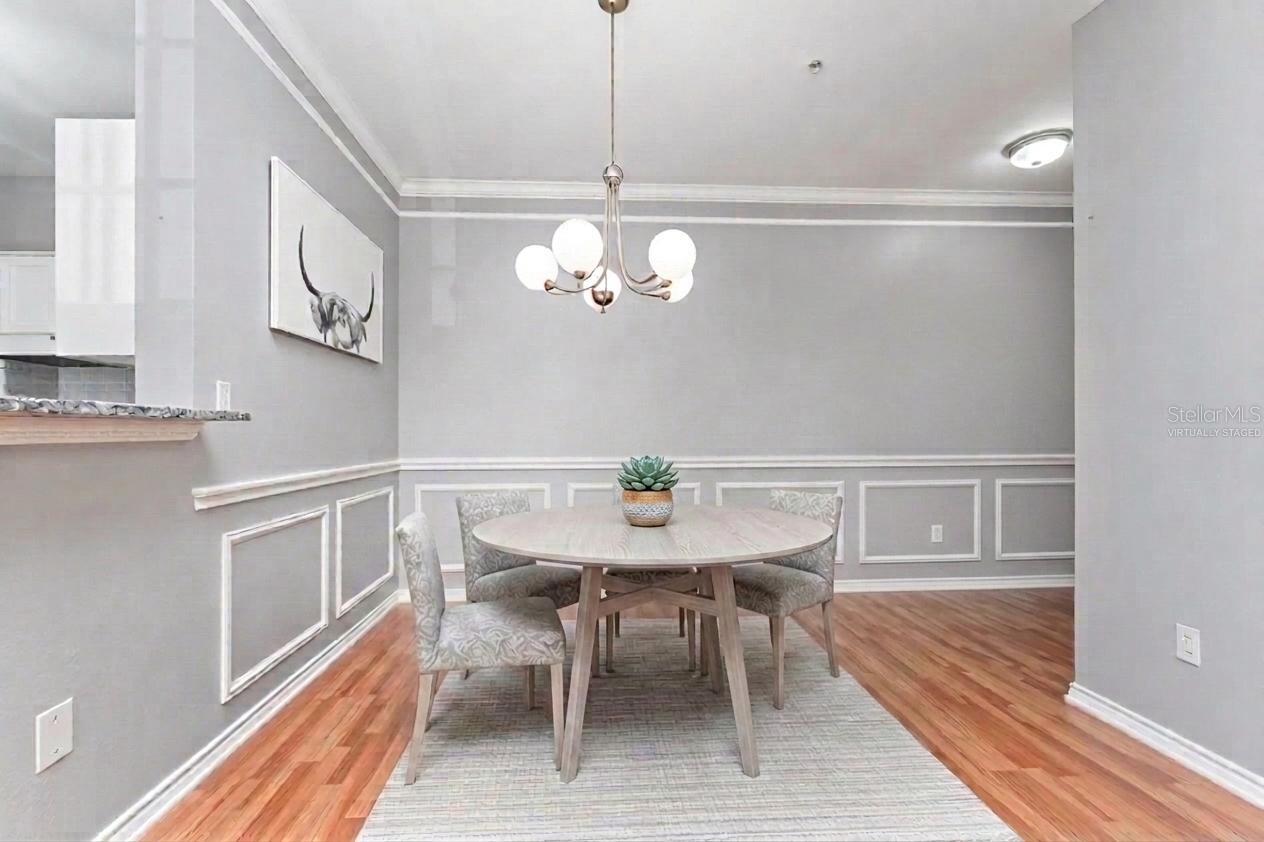 Dining area has been virtually staged