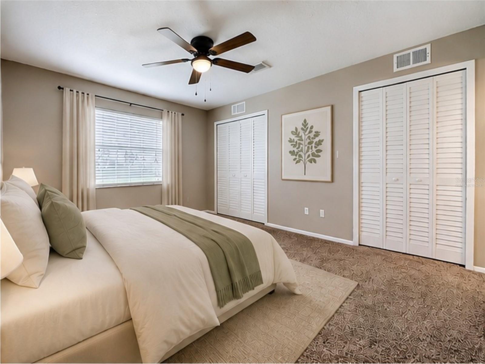 VIRTUALLY STAGED: Primary Bedroom (View Two)