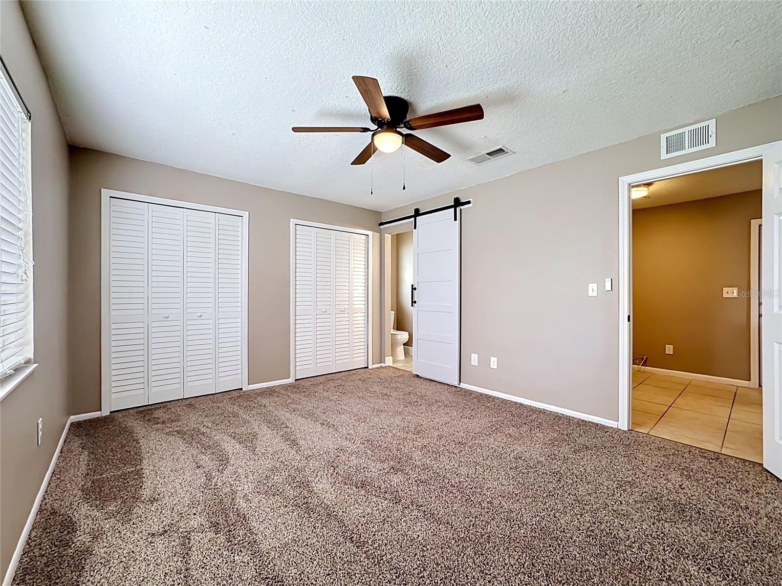 Primary Bedroom (View Three)
