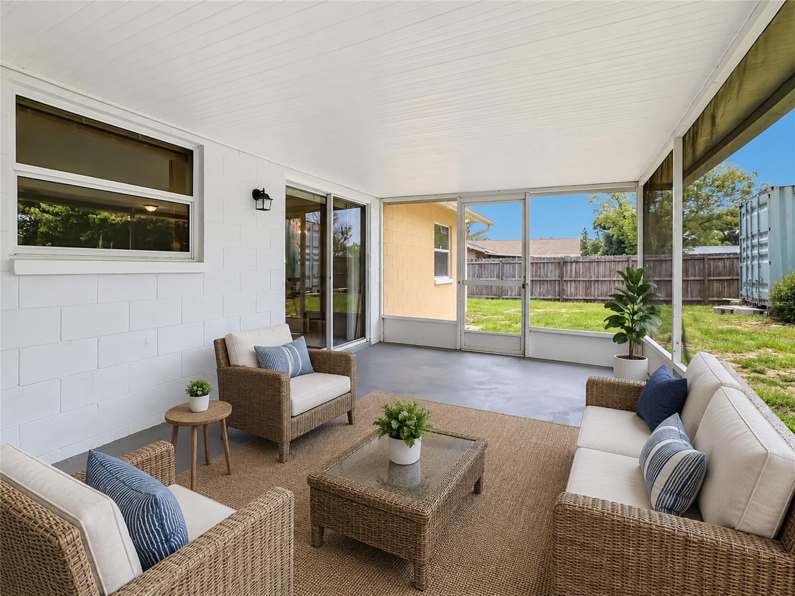 VIRTUALLY STAGED: Rear Screened Lanai (View One)