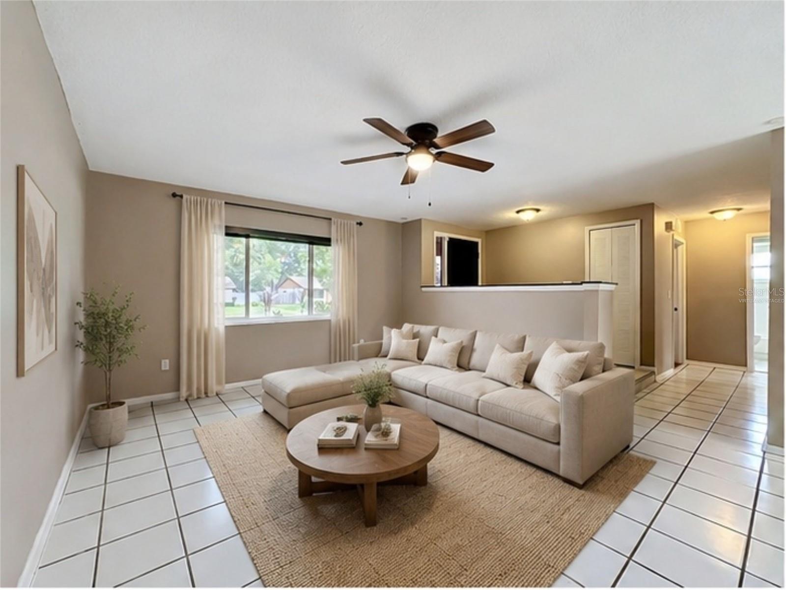 VIRTUALLY STAGED: Family | Living Room (View Two)