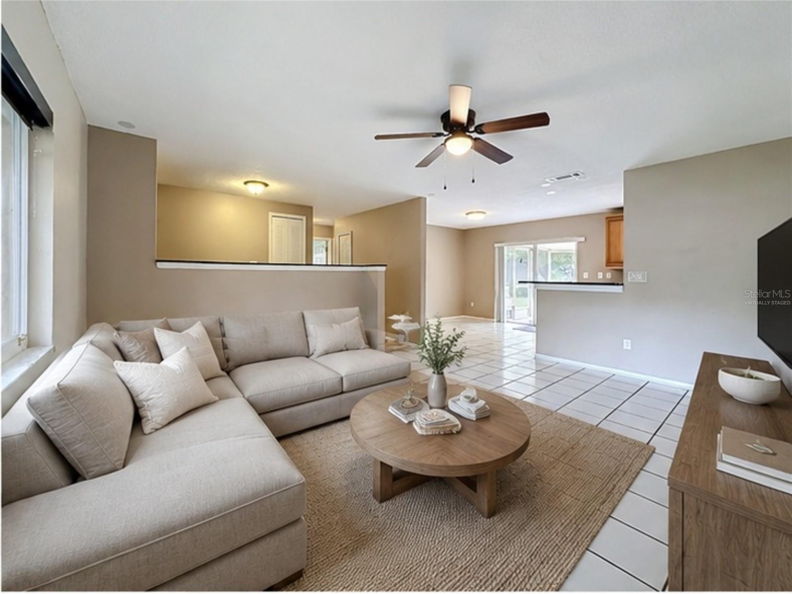 VIRTUALLY STAGED: Family | Living Room (View Three)