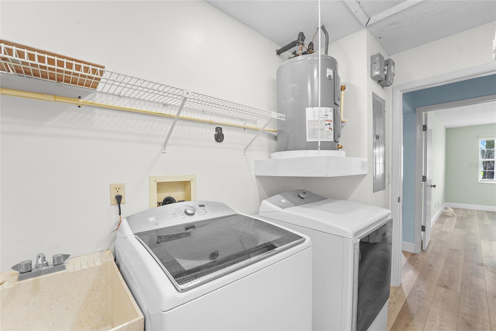Utility sink and water heater