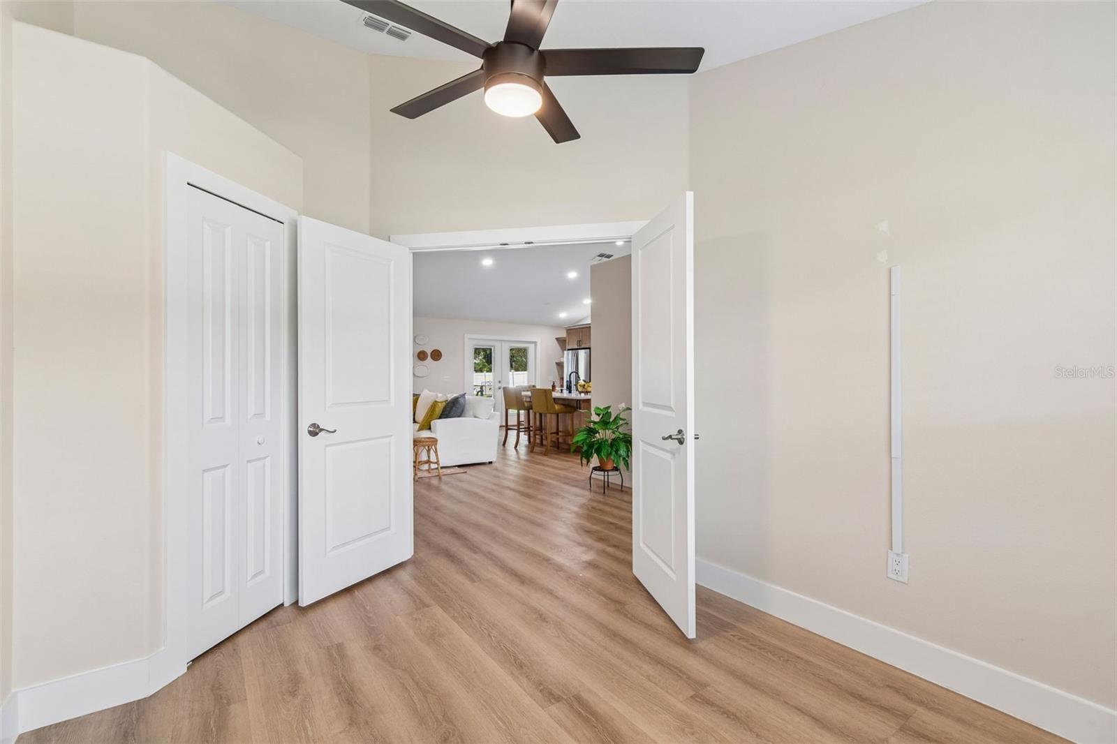 Bedroom 4 with double doors.