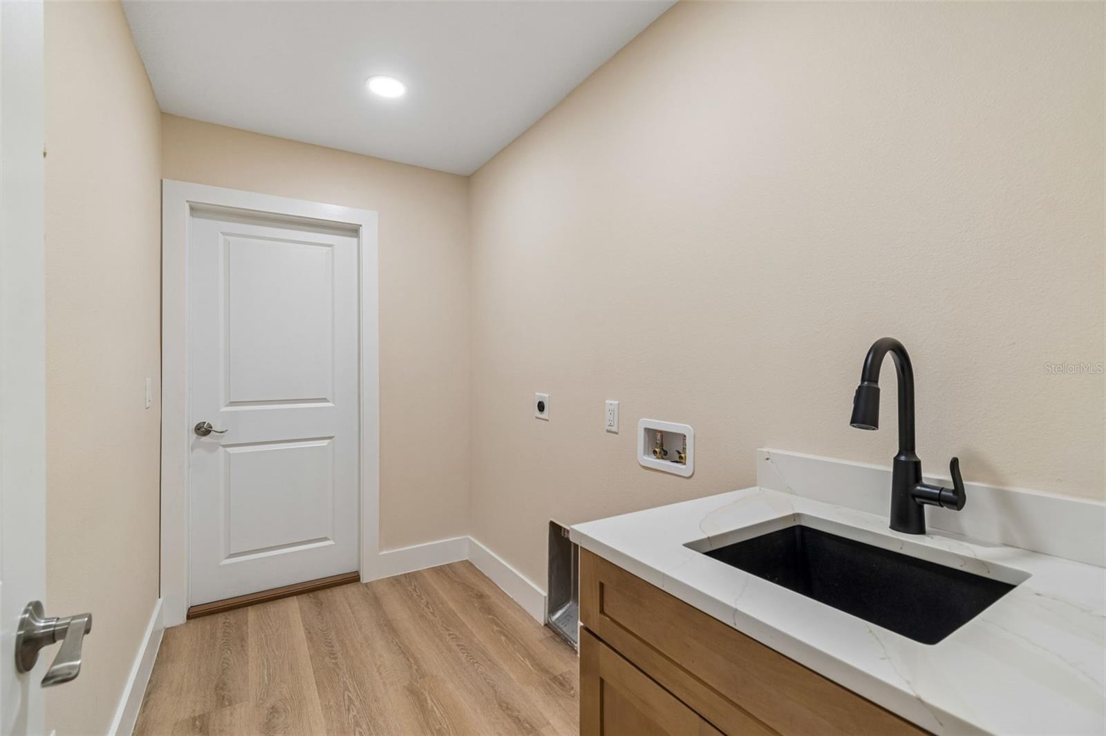 Laundry room off garage