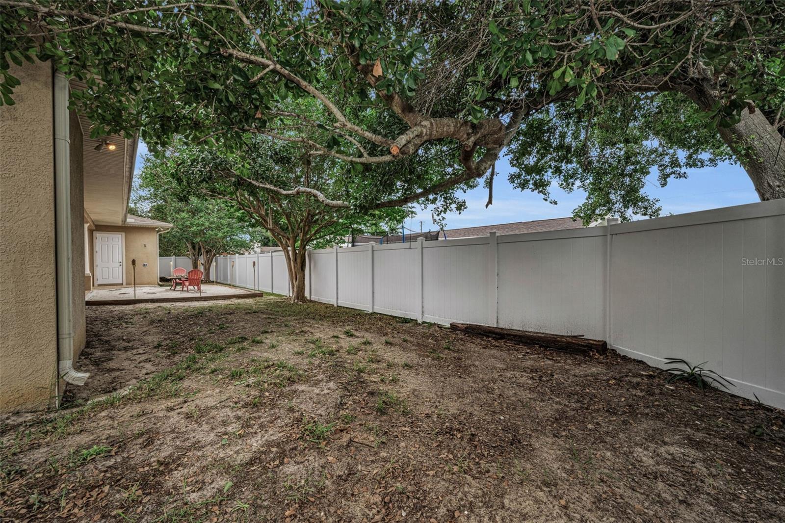 Newer white vinyl fence under 2 years old
