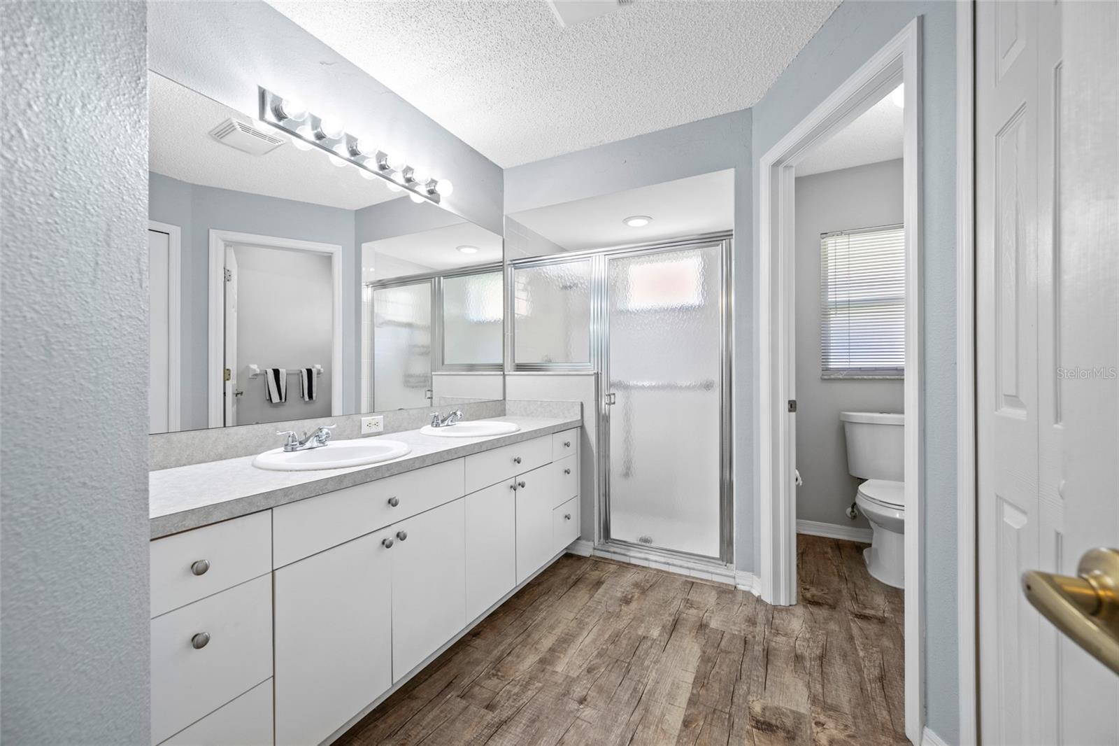 Primary Bath with Dual Sinks and Water Closet