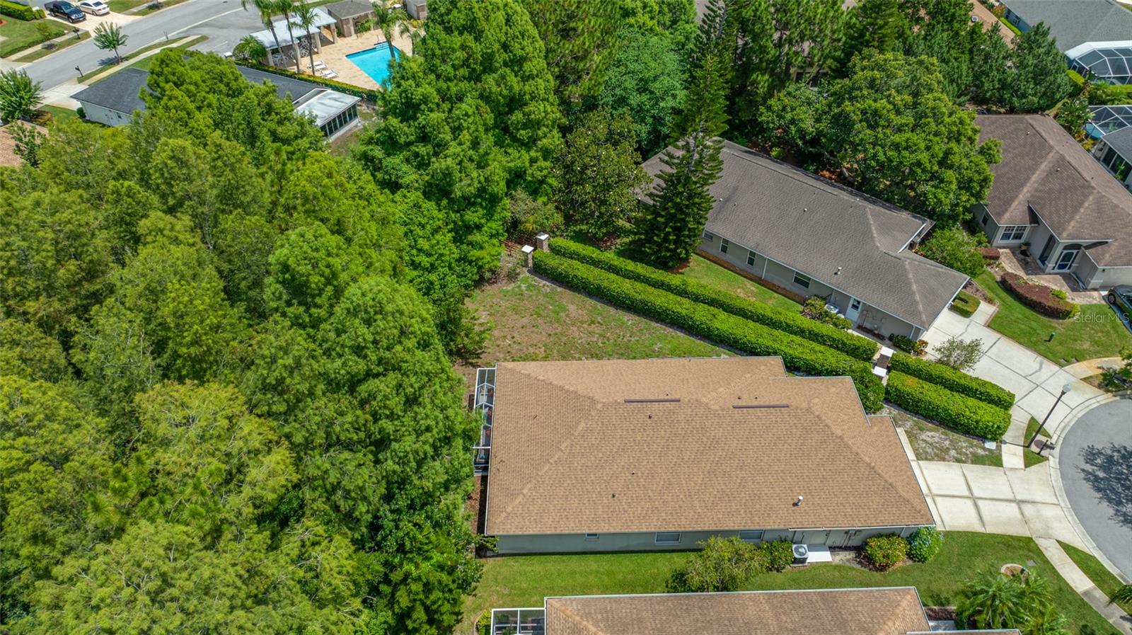 Aerial view of home and Walkway to Community Pool