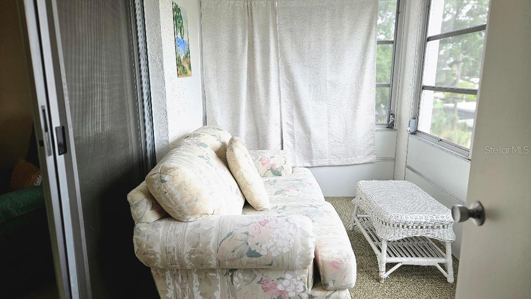ENCLOSED BALCONY WITH WINDOWS