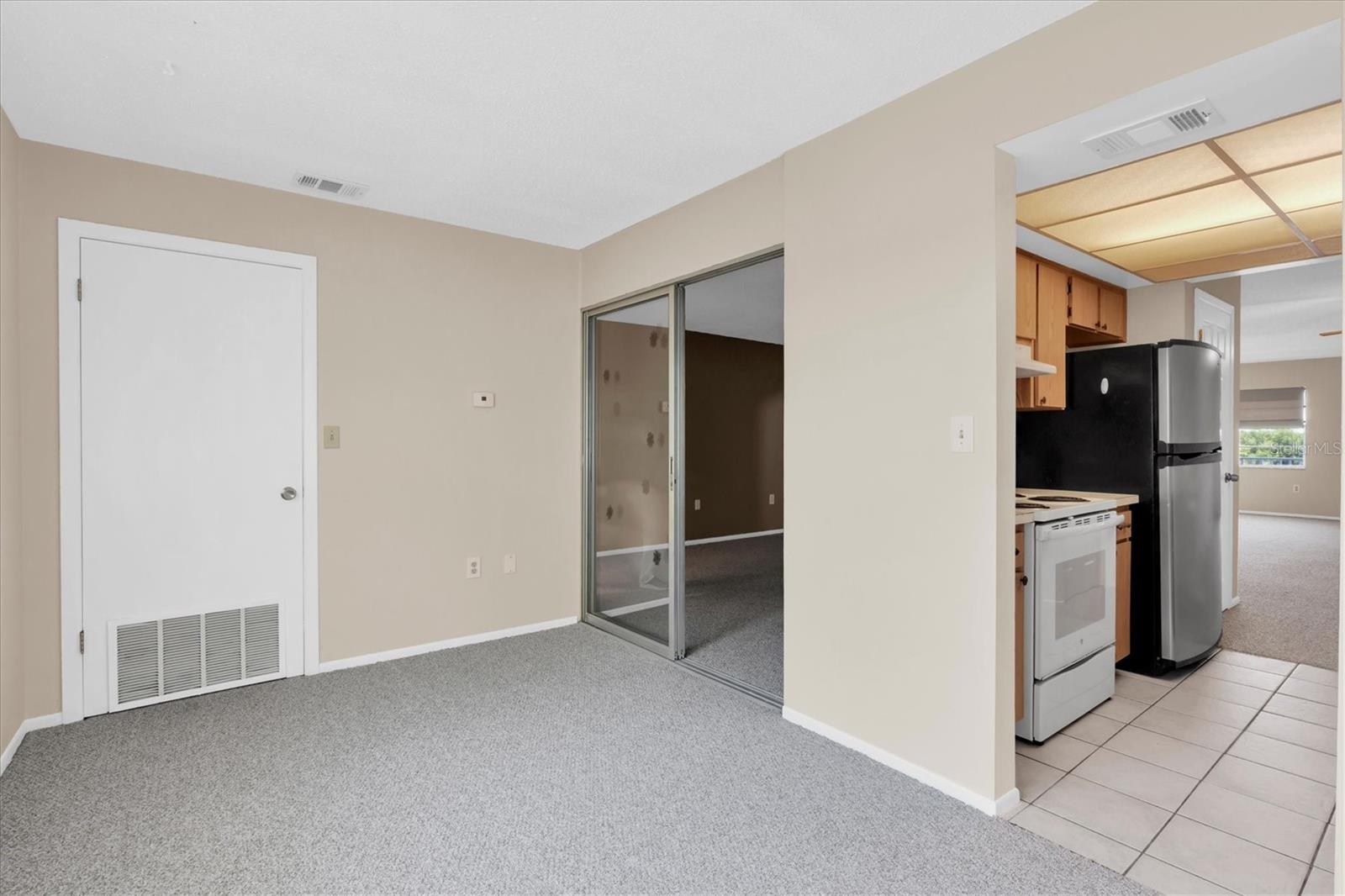 Florida room looking towards bedroom and kitchen