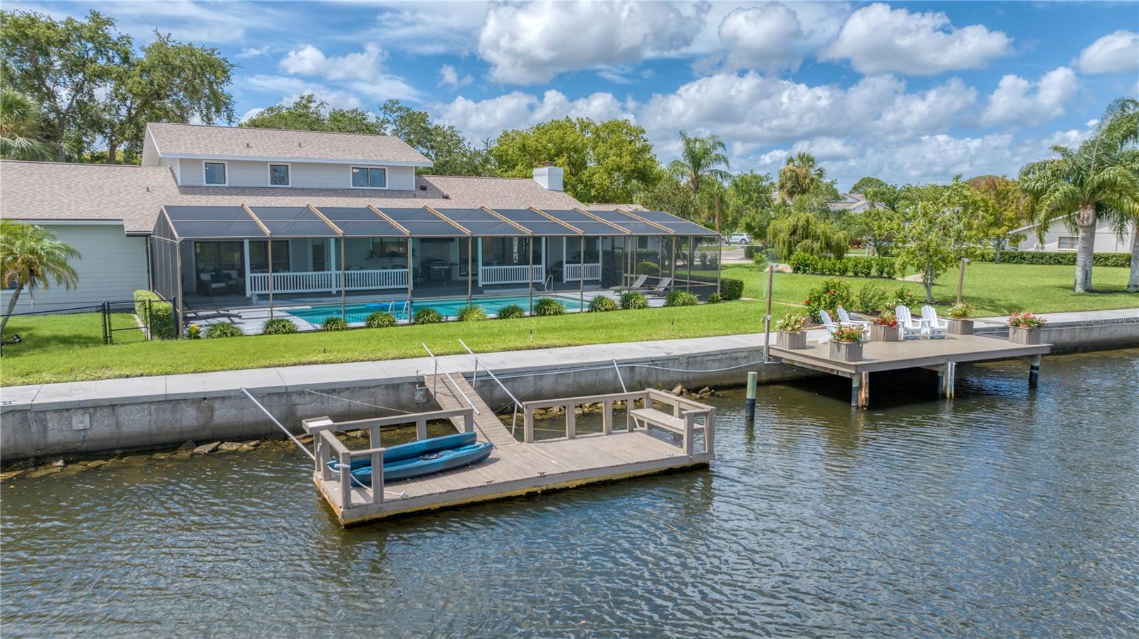 130 ft of Seawall with floating dock and stationary dock