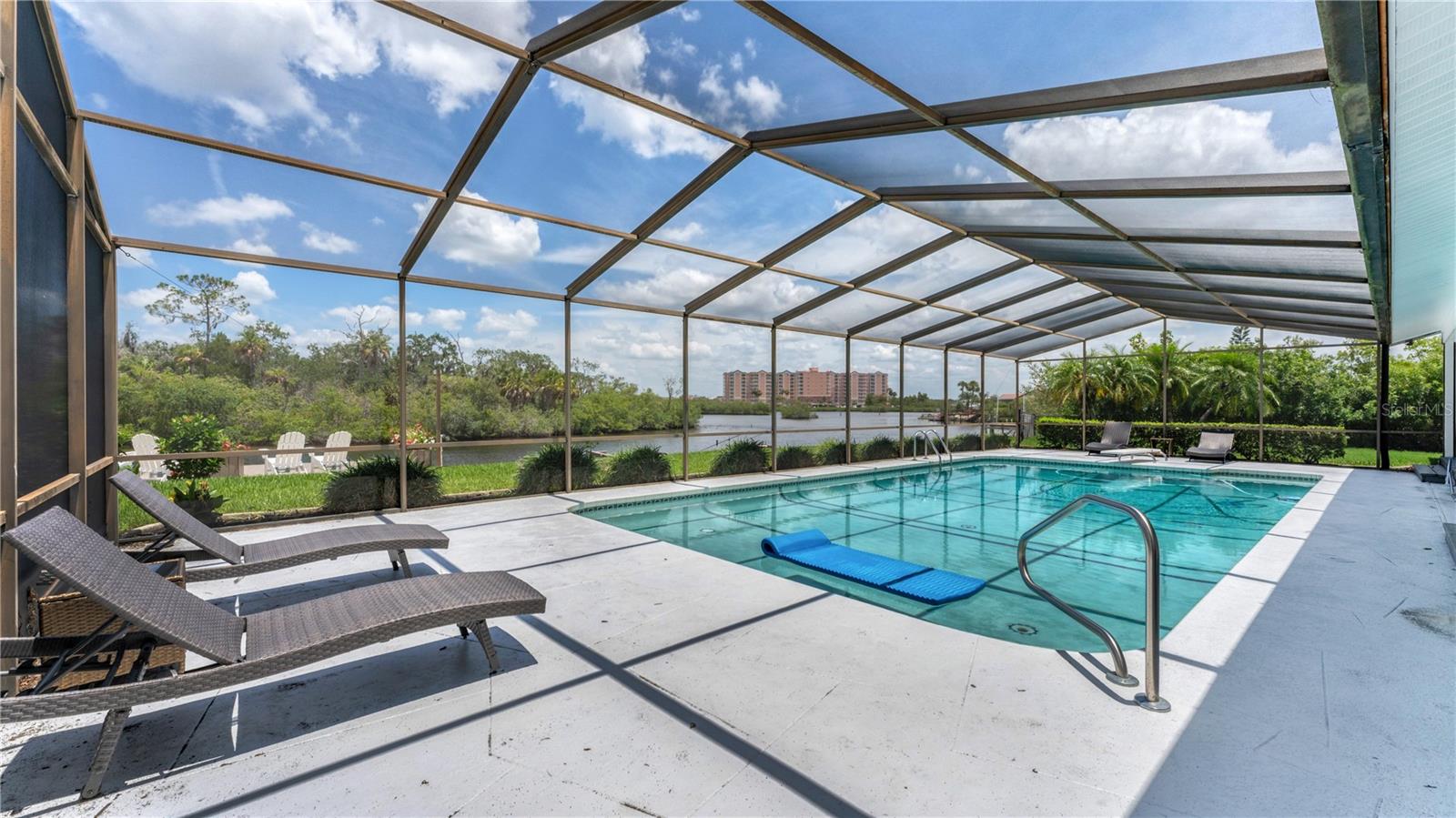 Screened-in pool and covered back porch area