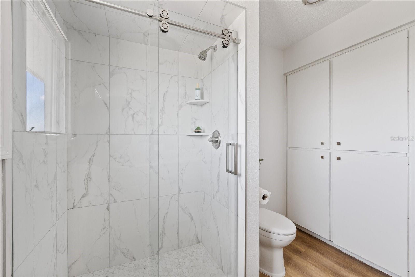 Upstairs shower in hallway bathroom