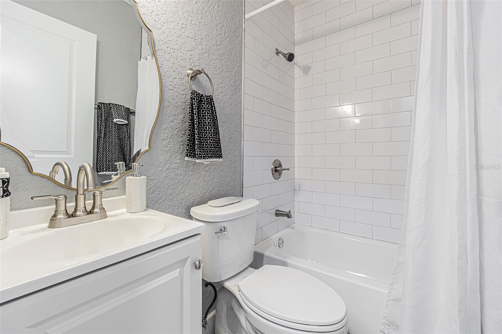 Updated Bath ---White Subway Tile ---so sparkling clean!