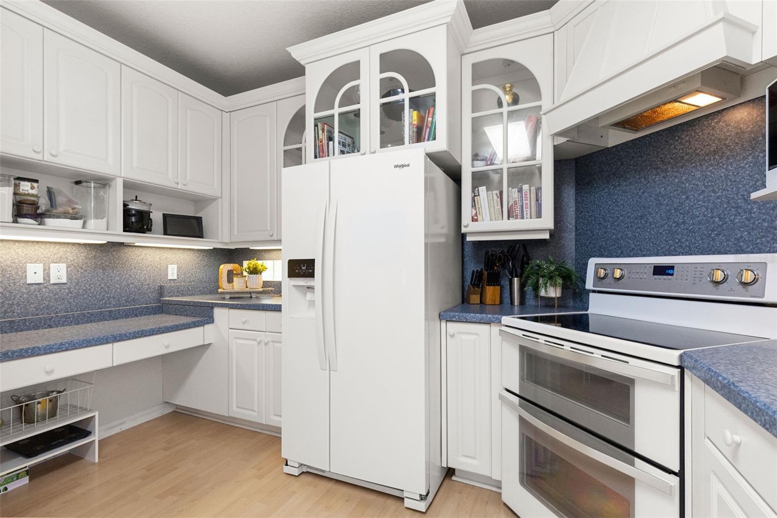 Another view of kitchen cabinets