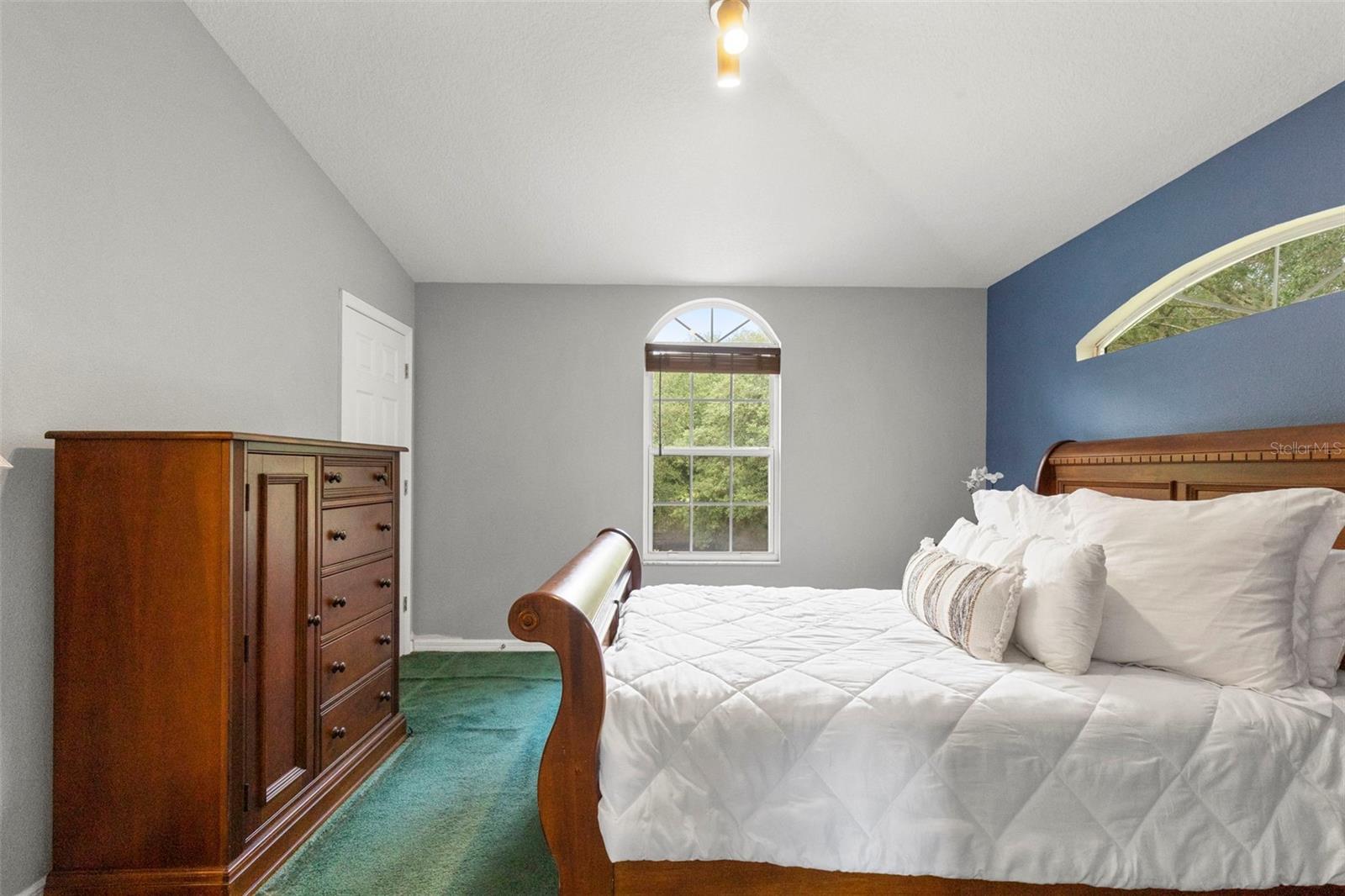 Another view of primary bedroom