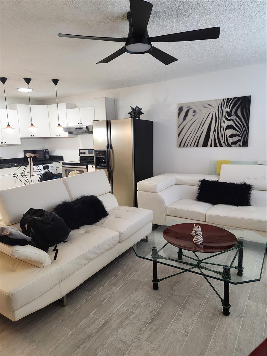 Open conept with newer fixtures & tile floors throughout