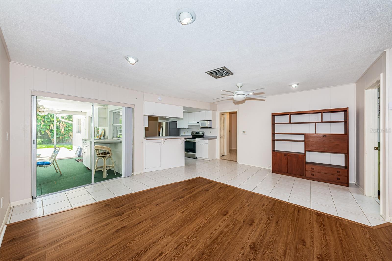 Family room overlooking lanai and pool