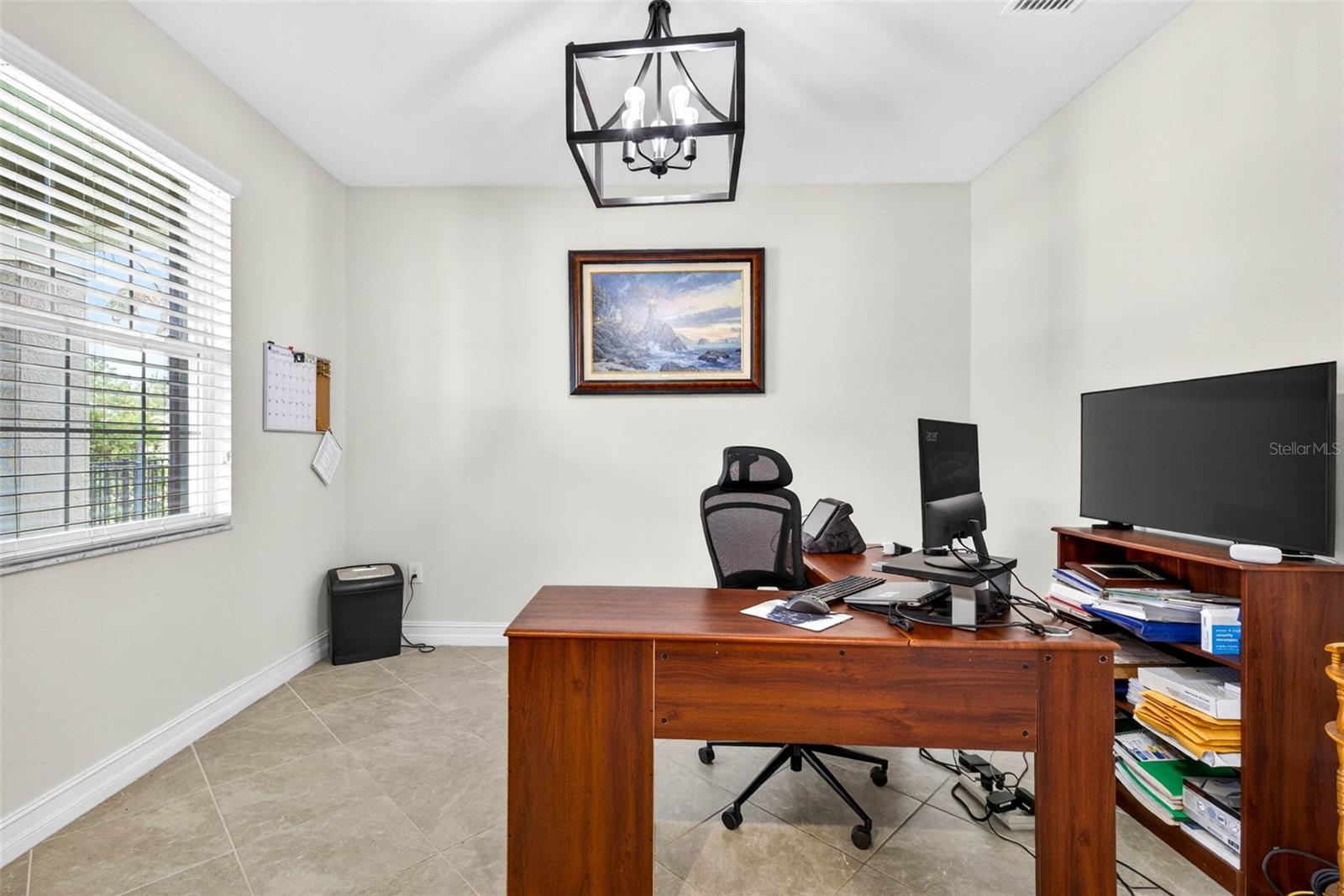 First floor office by the entryway.  Doors added for privacy.