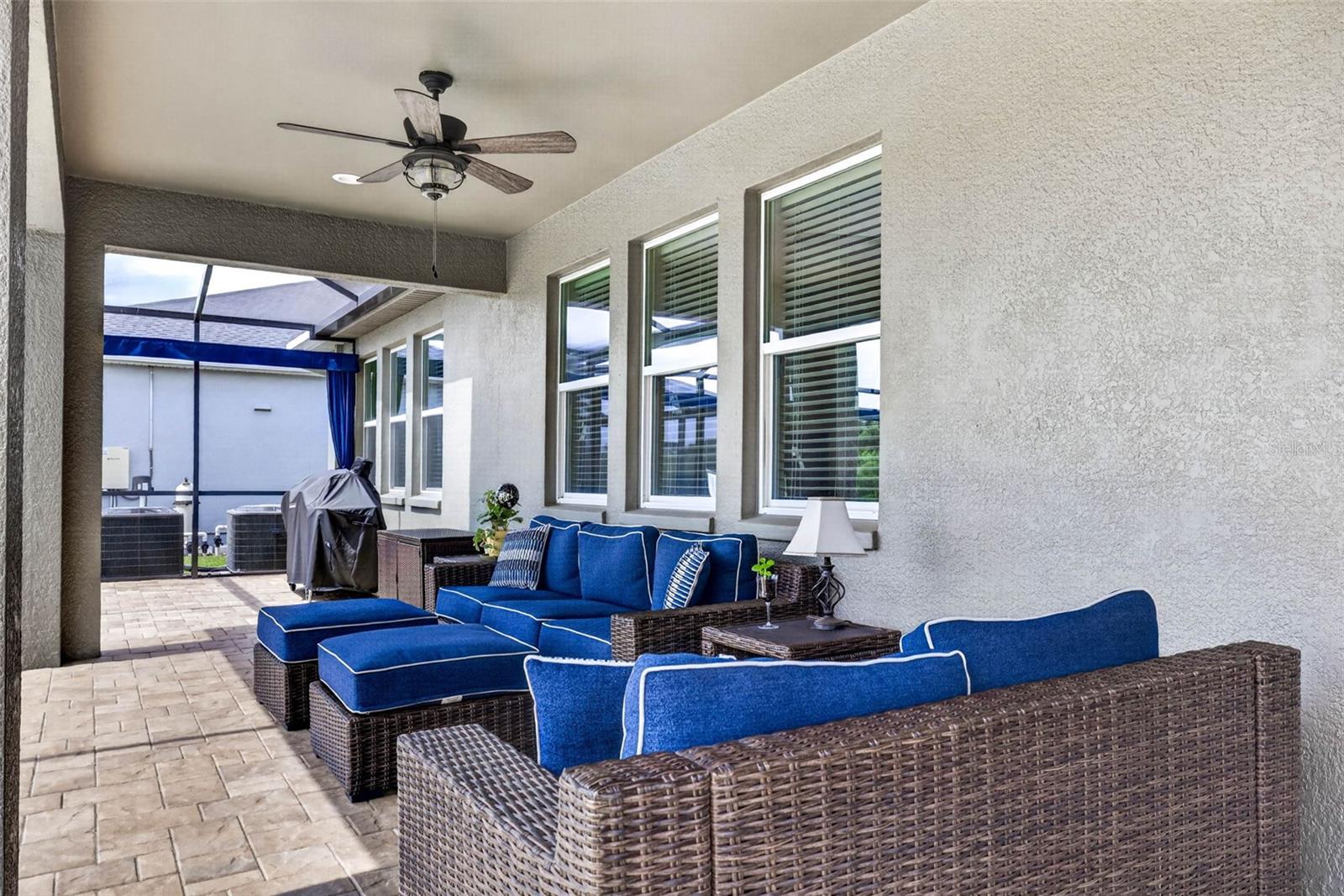 Seating area with outdoor fan.