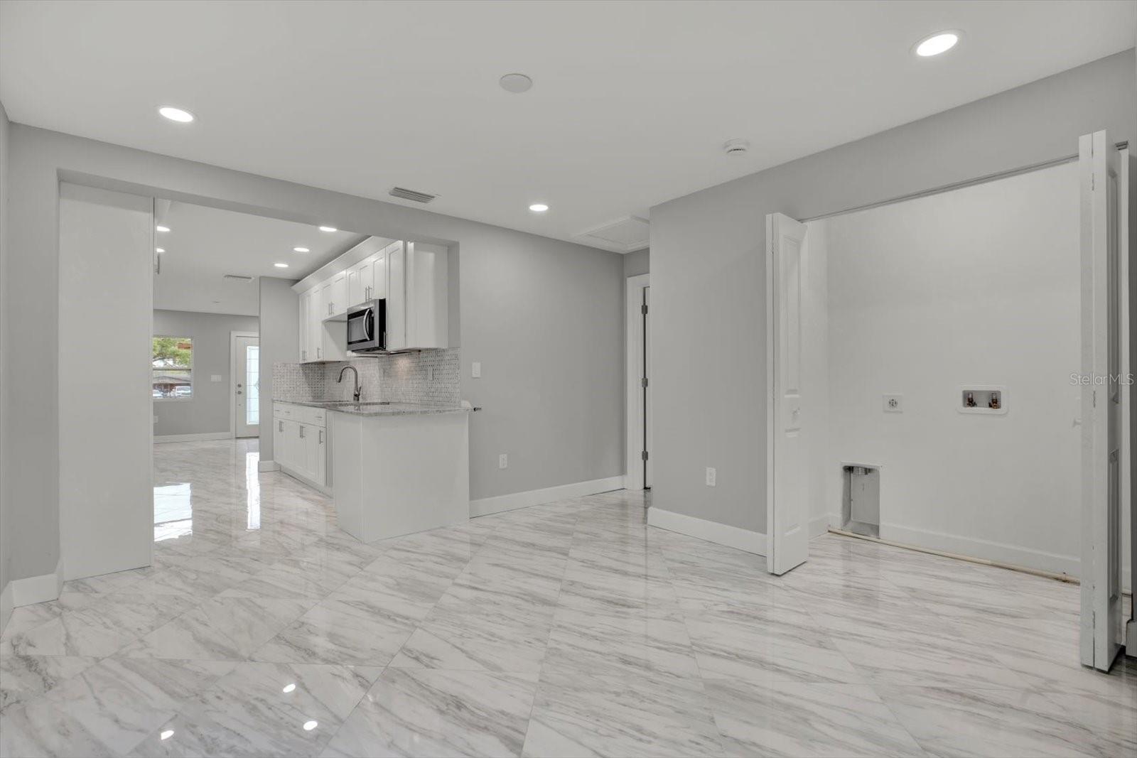 Dining- Family room with  built-in Laundry closet