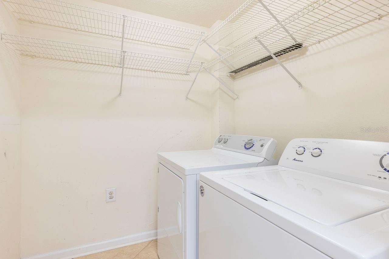 Oversized laundry room perfect for extra storage.