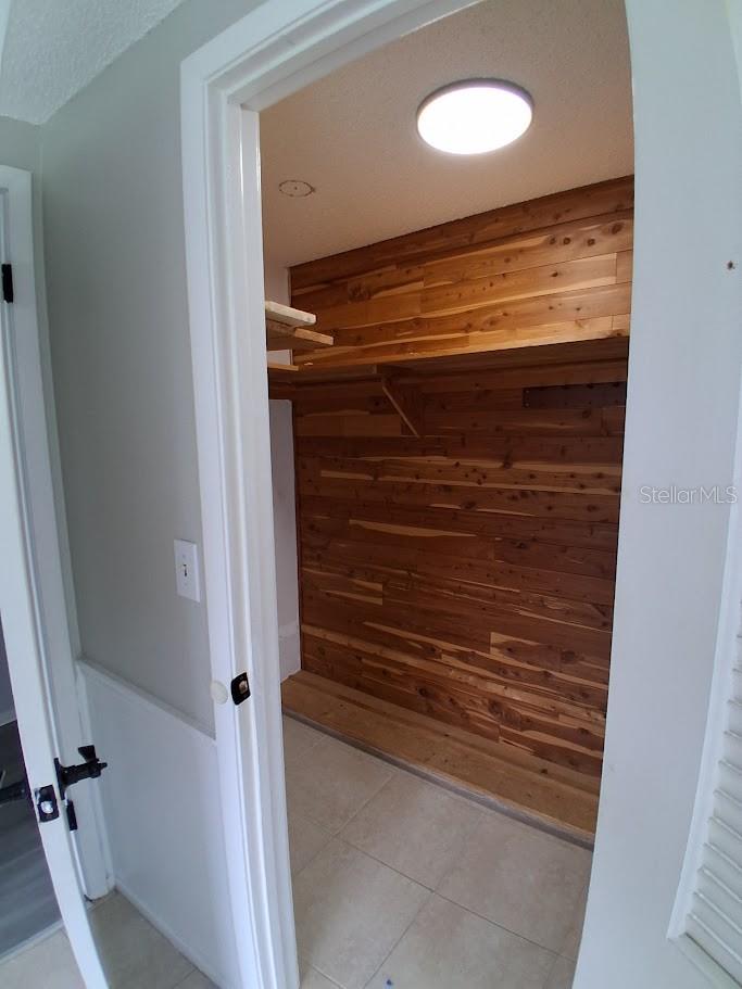 Walk-in closet in master bedroom