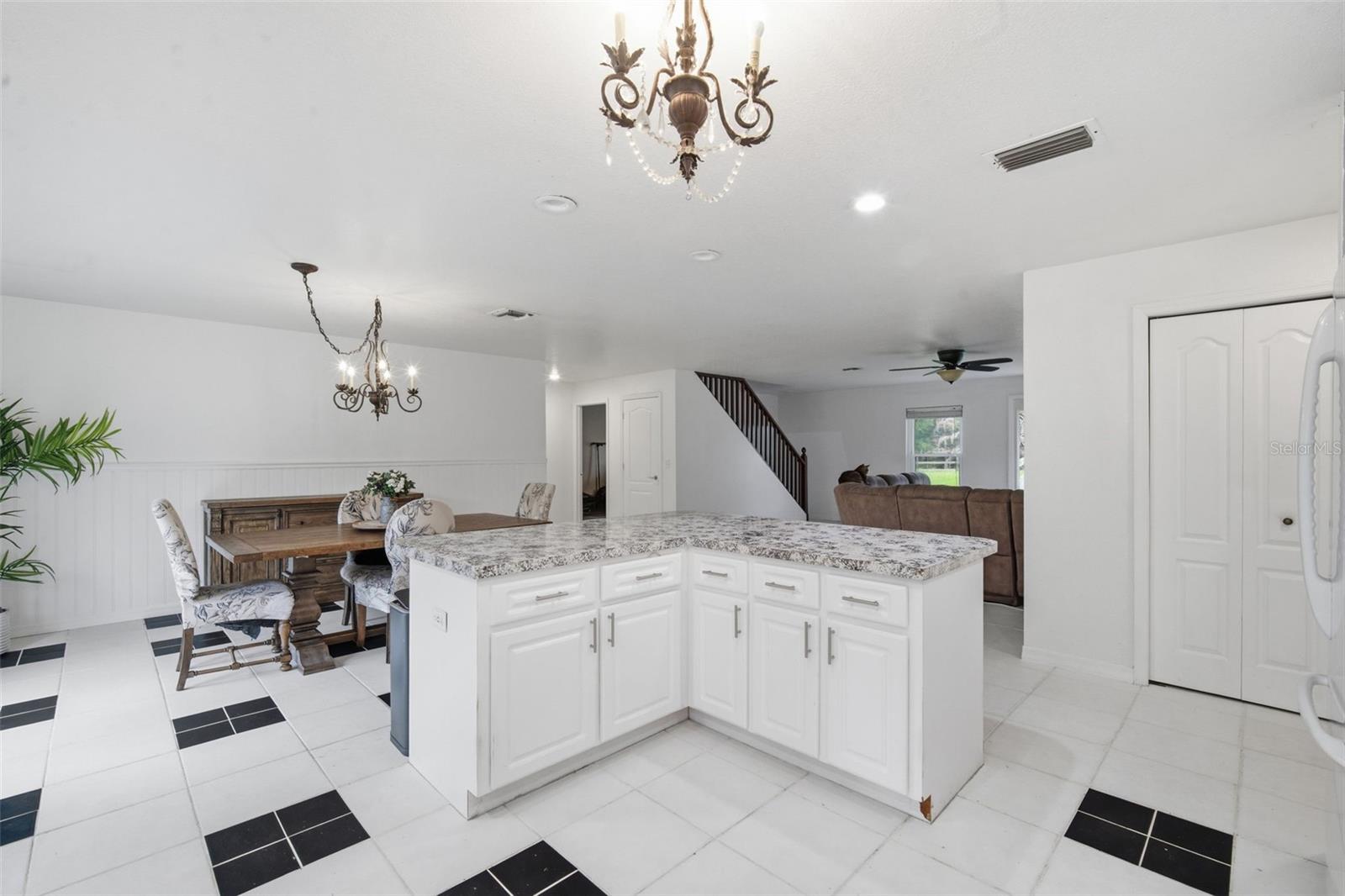 To the right is the Master Suite. SPLIT floor plan. Fantastic privacy. Laundry room is also adjacent to Master Suite.