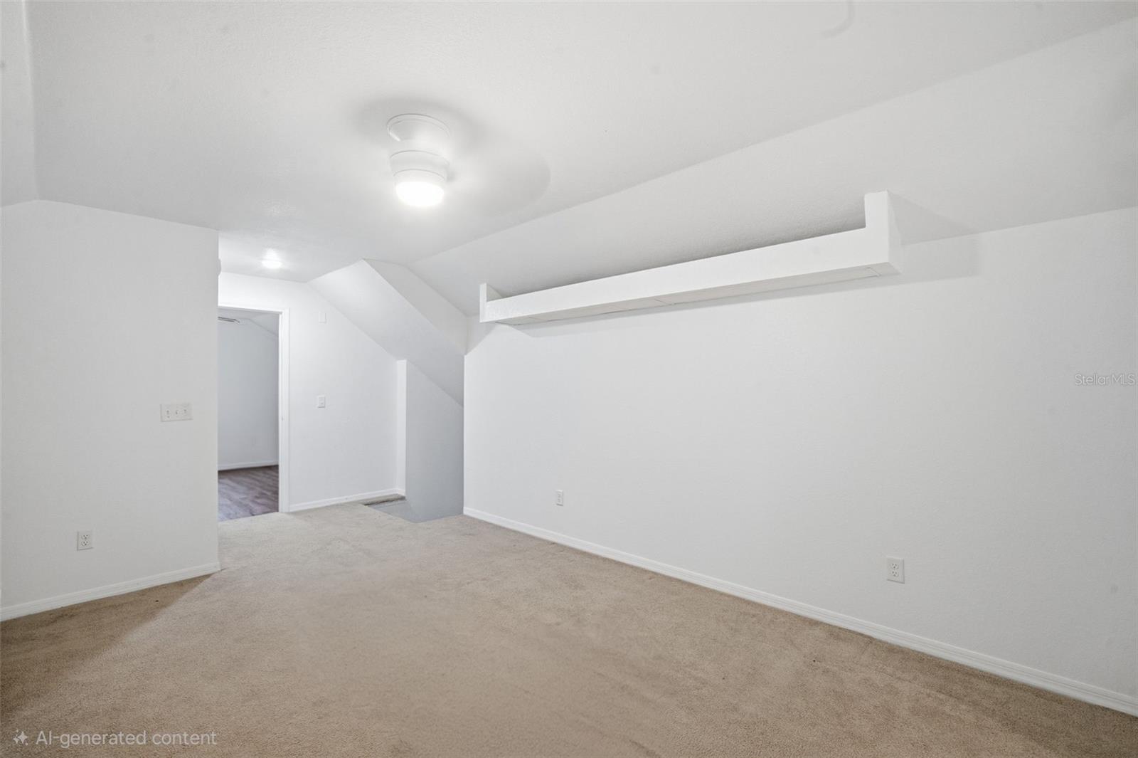 Upstairs Living room. Door to the left is Bed 4 (used as office). To the righ is the top of the stairs.
