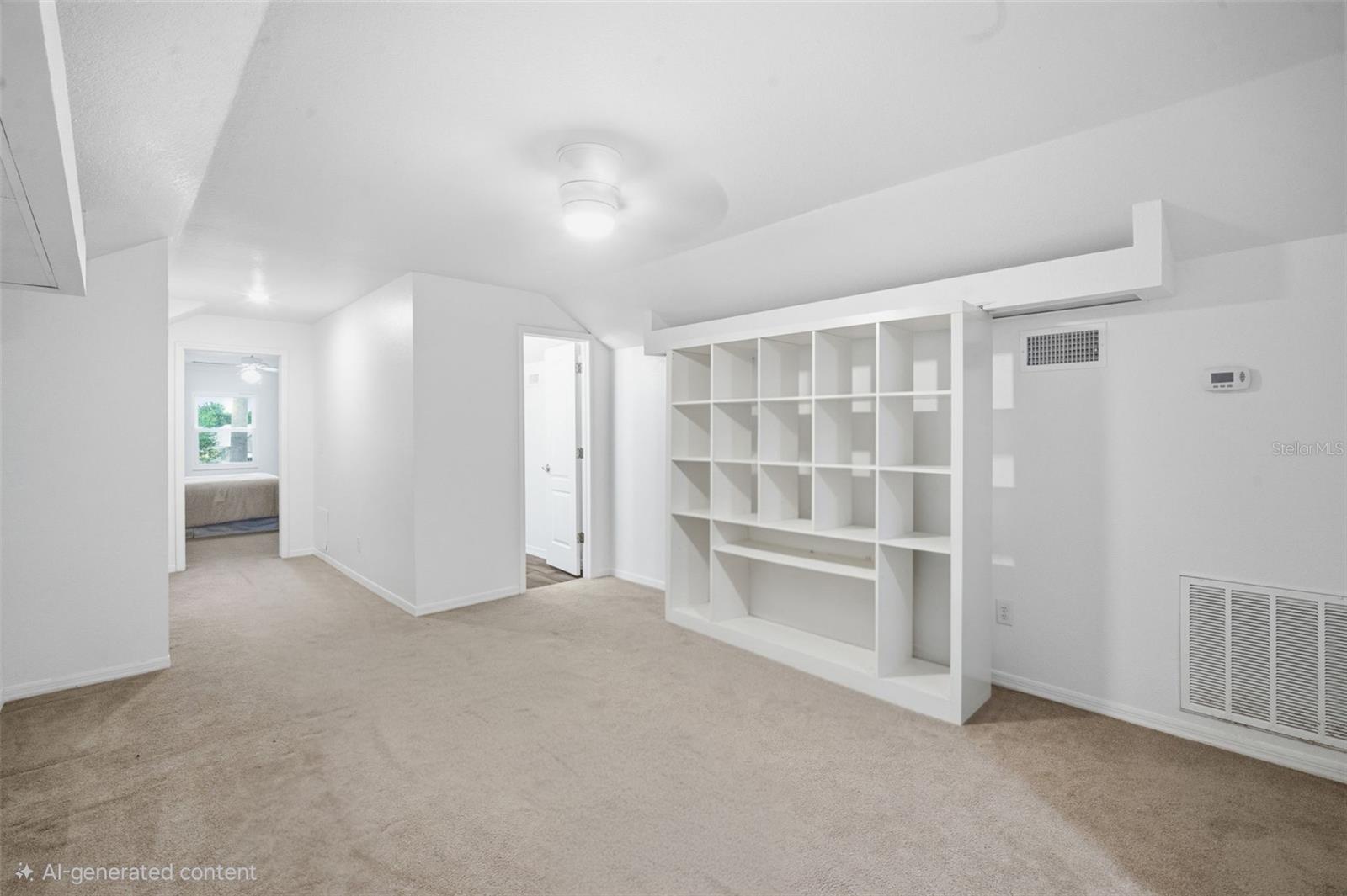 Leaving Bed 4 (office) back into upstairs living room. Door on the right is the 3rd Bathroom (upstairs).