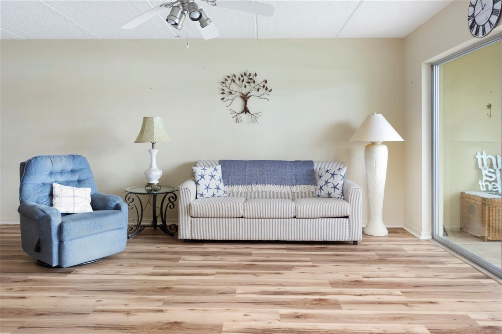 Contemporary style, Florida room has sliding glass windows too.