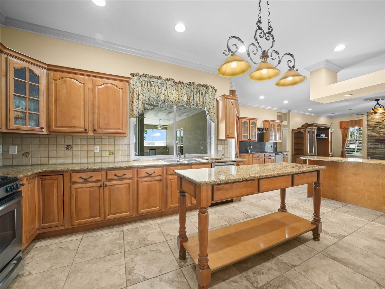 Pass-through windows from the kitchen to patio-great for hosting!