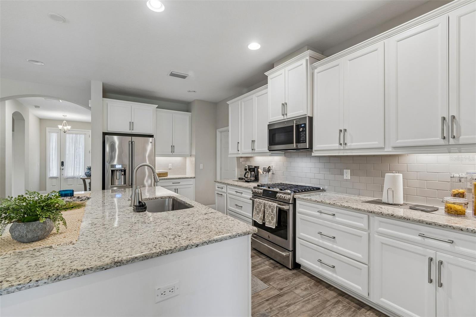 8' 5' kitchen island - premium cabinets - granite, undercabinet lightning, tile backsplash, natural gas