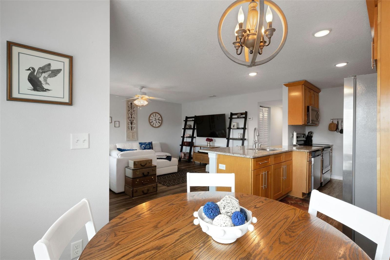 Dining Area Looking to Kitchen and Living Room