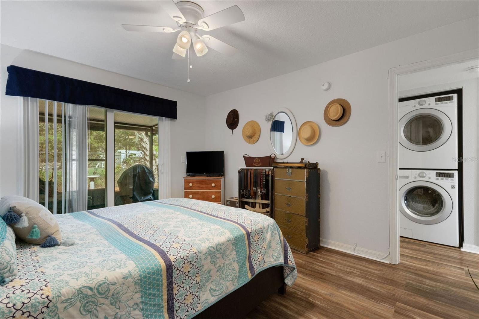 Primary Bedroom With Sliders to Screened Porch