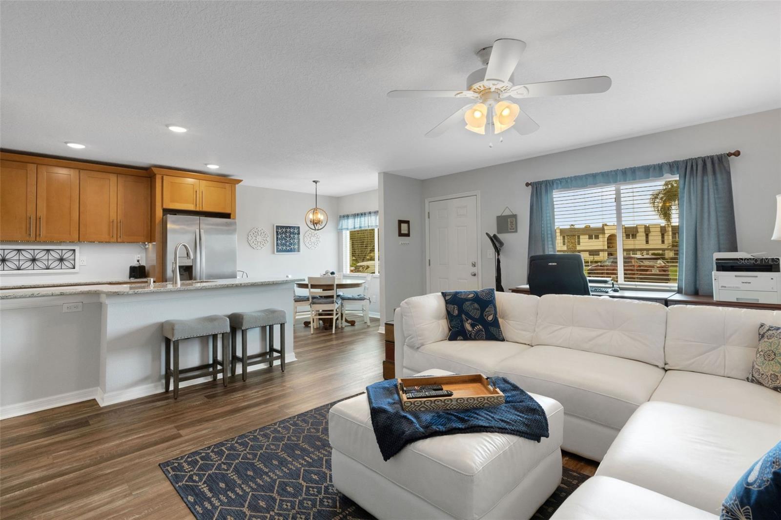 Living Room Looking to Dining Area and Kitchen