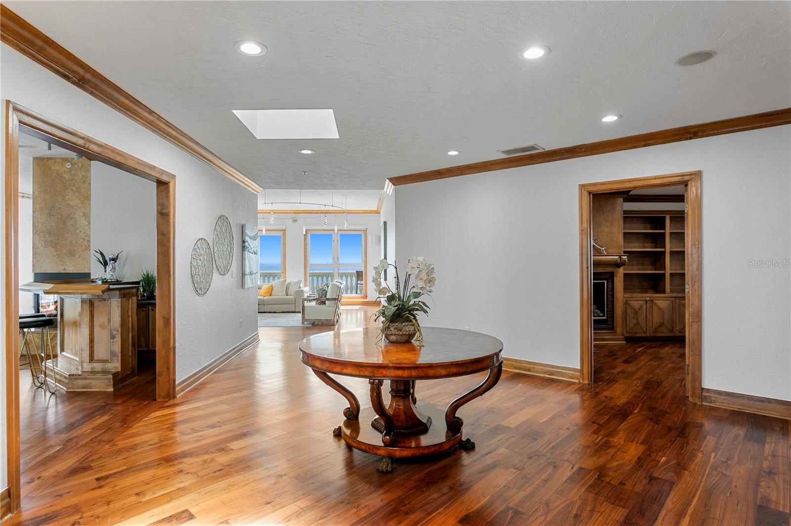 Entry foyer with bay view at end of hall