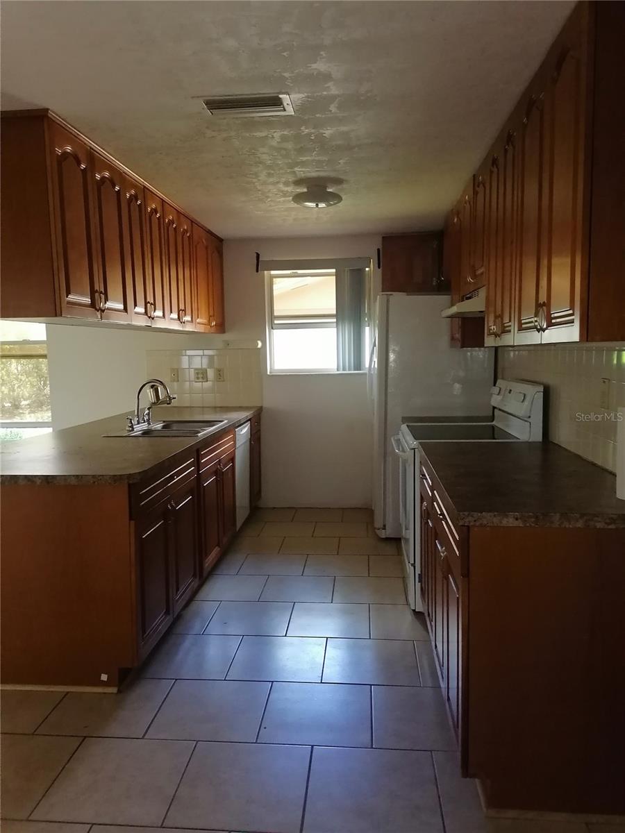 Kitchen next to family room