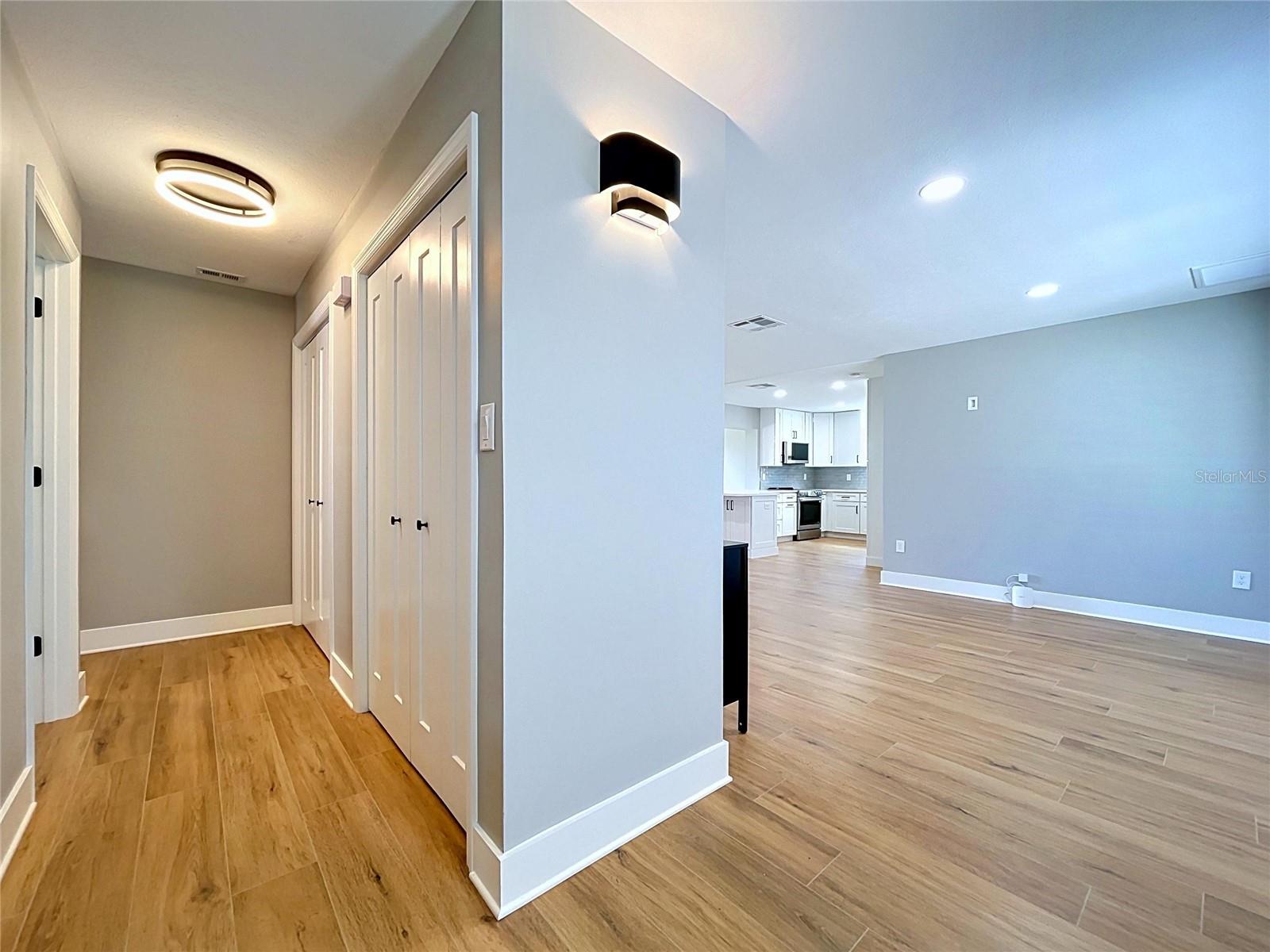Hallway with storage closets