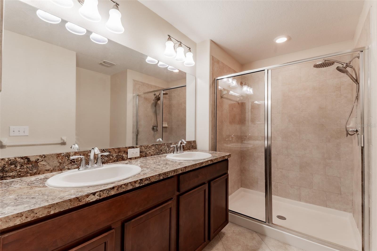 Primary bathroom with double sinks.