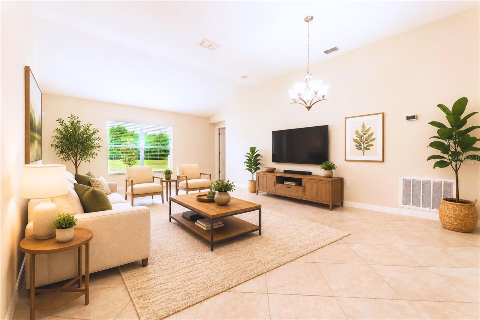 Decor virtually staged. Living room