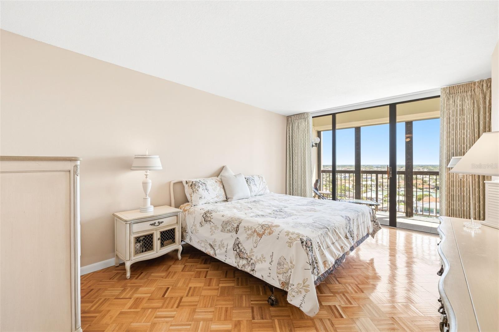 Primary bedroom and private balcony