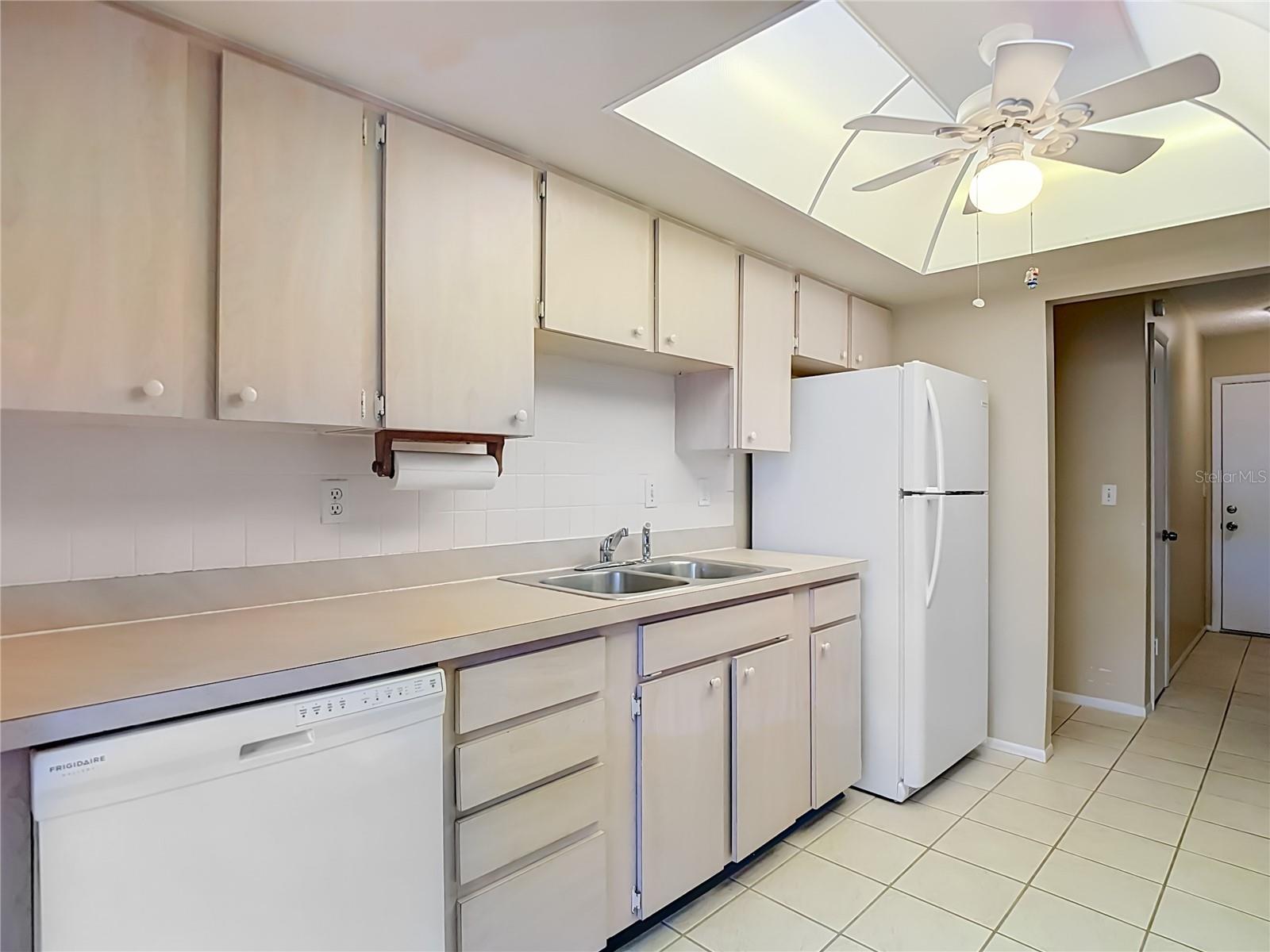Lots of cabinetry, dishwasher and disposal under the sink.